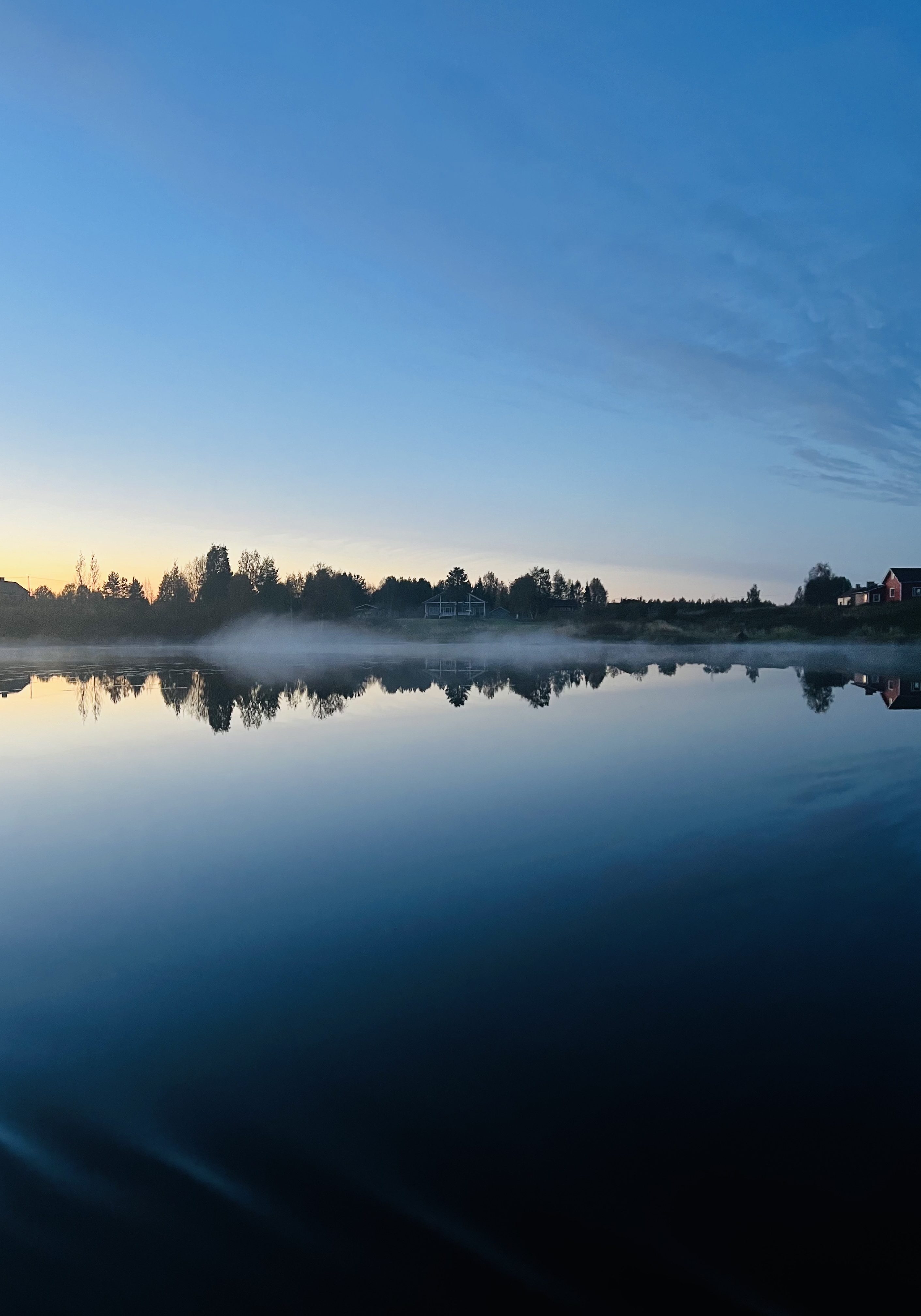 Abendstimmung über einem See in Lappland. Foto: M. Trinius